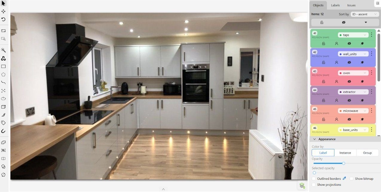 Open-plan kitchen with the island separated from the perimeter run — source
